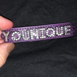 Purple YOUNIQUE letter bracelet